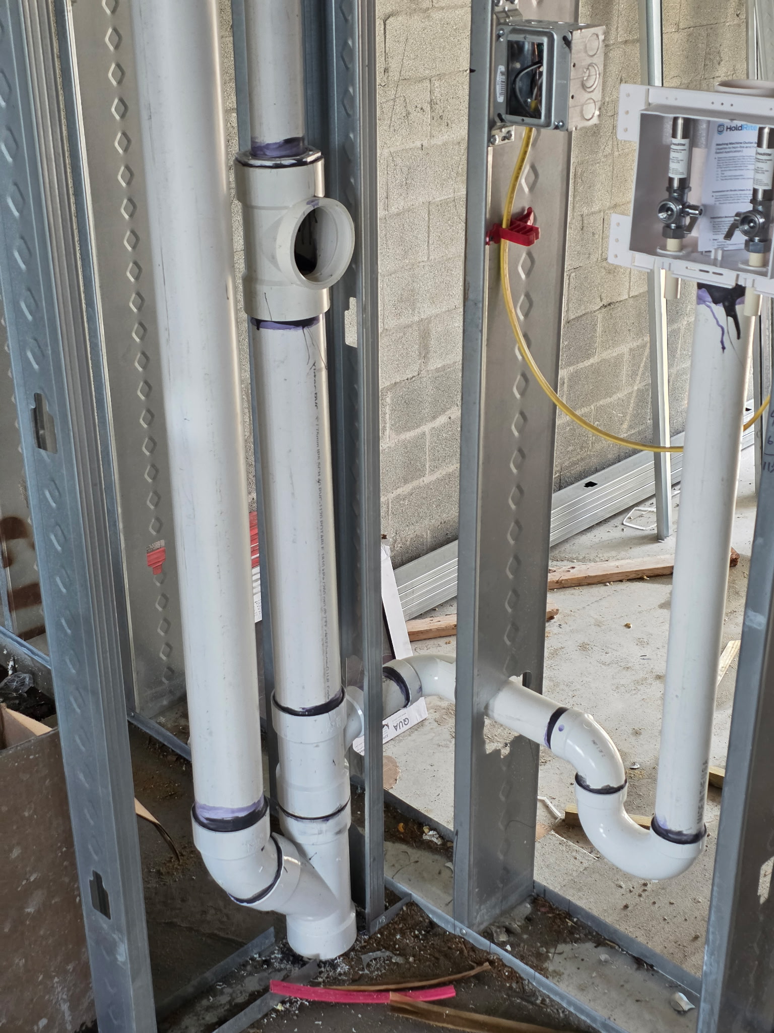 Vertical waste and vent stack rough-in